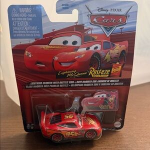 Mattel Disney Pixar Lightning McQueen car with Rusteze sign. New Factory sealed